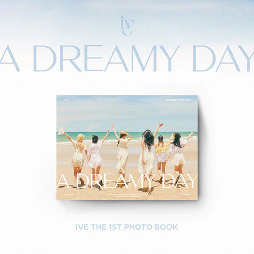 Album photobook cover with k-pop girl group IVE on a beach in white dresses and text 'A Dreamy Day' on a light blue background.