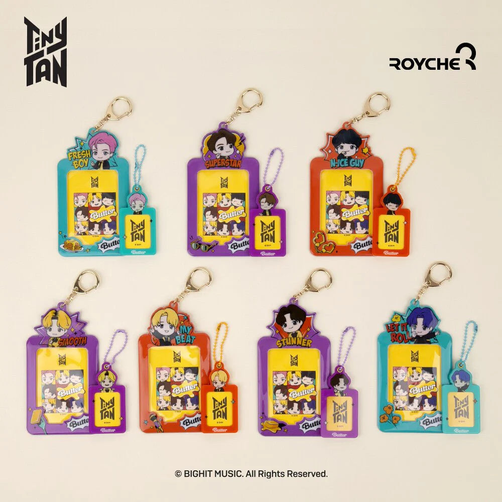 Set of keychains with cartoon characters on colorful cards, featuring Tiny Tan and Royche logos.