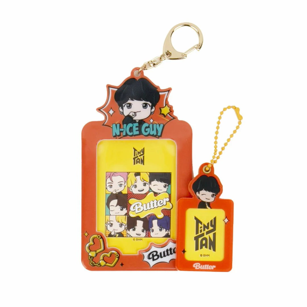 Keychain with cartoon character and 'N-I-Ce Guy' text on a white background