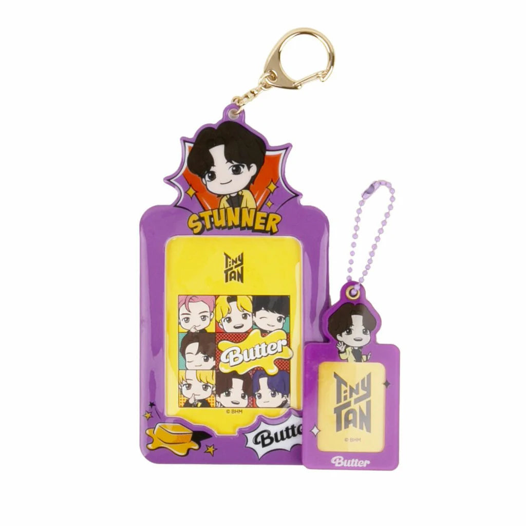 Keychain with cartoon characters on a purple background