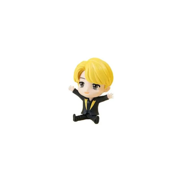 Small BTS TinyTAN Jimin figurine with blonde hair and black outfit on a white background
