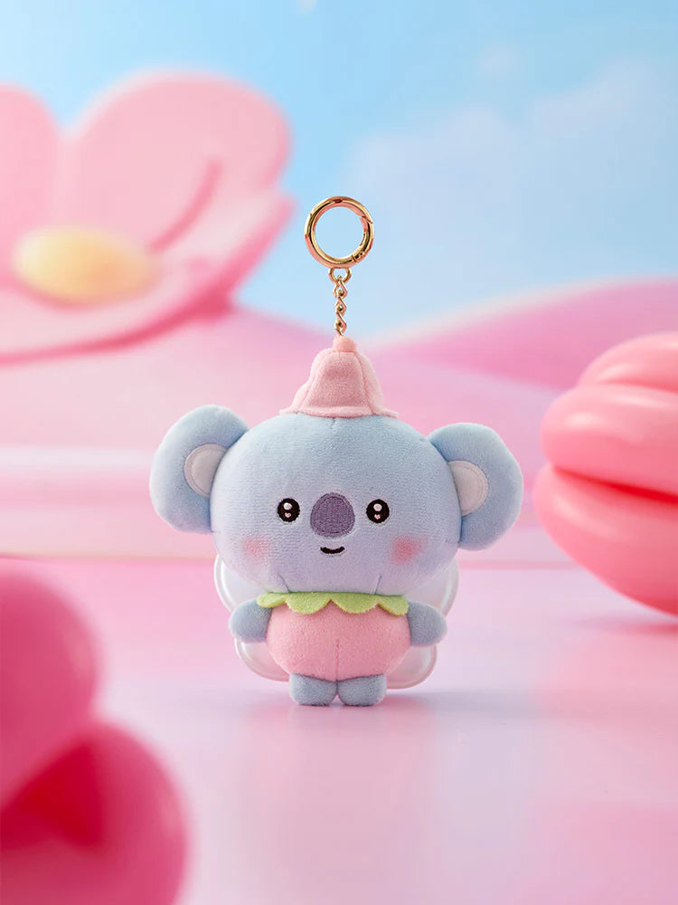 Cute BTS BT21 Koya plush keychain with a spring fairy cartoon character on a soft pink and blue background