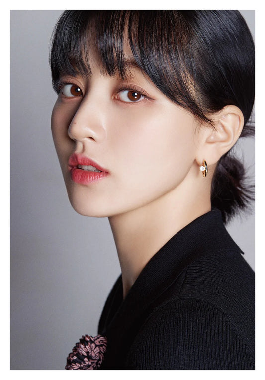 A collage of various portraits members of a K-pop group TWICE, displayed in a 3x3 grid format with a 'Dispatch 10th Anniversary' text overlay.